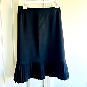 Black pencil skirt/ruffle bottom. Very flattering skirt.